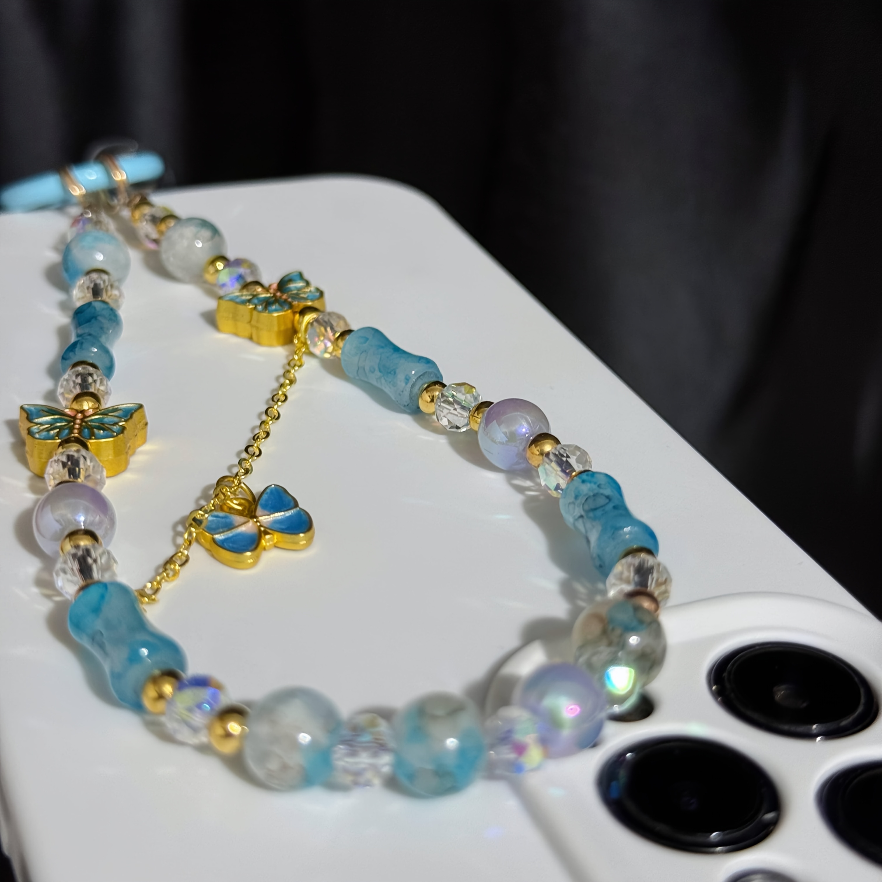 Retro gold butterfly phone cha - đánh giá và giá Butterfly Pendant Necklace
